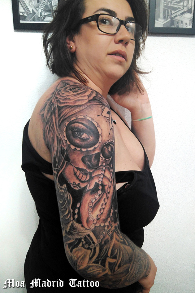 Tatuaje de brazo entero en realismo