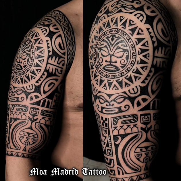 Tatuaje maorí de hombro a codo con sol
